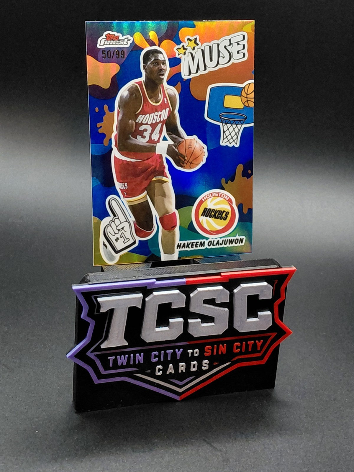 2025-26 Topps Finest - Muse Hakeem Olajuwon #M-17 Blue Refractor /99